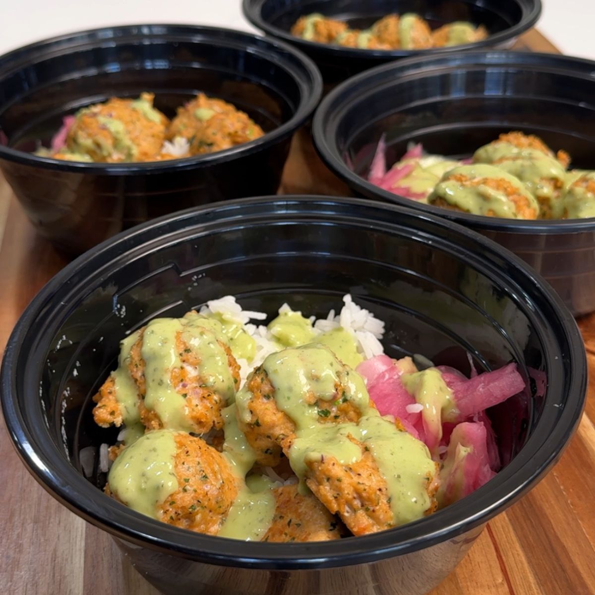 Baked salmon meatballs in meal prep container